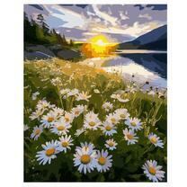 Поле ромашек на рассвете